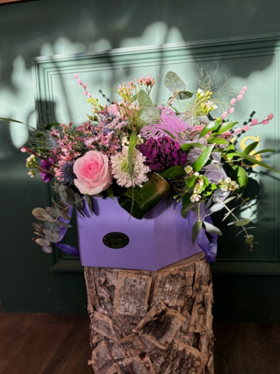 Pretty & Wild Hatbox - This gorgeous hatbox is filled with beautiful seasonal flowers and foliage, sat in a luxury hatbox with foam so the flowers are easy to keep and no arranging needed.
