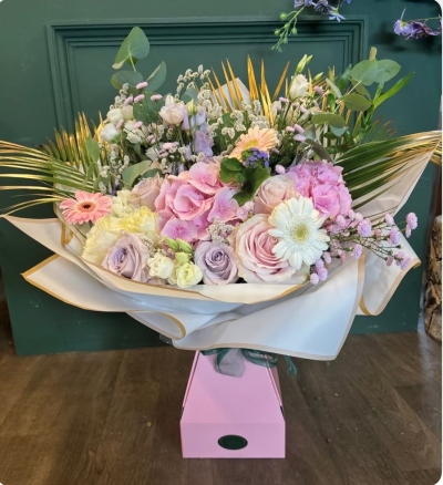Blush Garden - There is no better way to say 'I Love You' than the Blush Garden.. A dramatic bouquet filled with hydrangeas, mixed roses & fresh season pastel blush florals. Your choice of natural or gold tipped foliage - please choose in the 'comments' box, if left blank we will recreate as the photo with gold tipped greenery.